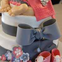 Baby Bum A new look to the baby bum cake. Cake was done in buttercream and fondant/ gum paste decorations.