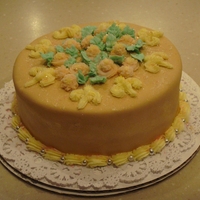 Anything Practice Cake Buttercream frosting with flowers on top
