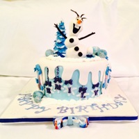 Disney's Frozen Cake..olaf On An Icy Pond All edible and custom made to order...Ice pond made of icing gel, with ice cubes made of blue jello...isomalt used to make candy made are...