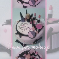 Love For Makeup A welcome home cake for my friend who is a mua: vanilla scented cake filled with caramel creme and crumb coated with semi-sweet chocolate...