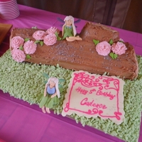 Woodland Fairy for my daughter's 5th birthday. A chocolate roll with a layer of Dulce de Leche & chocolate ganache filling covered in chocolate...