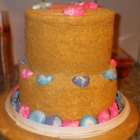 Sand Castle For my daughter's 4th birthday, a backyard beach party. My first and only stacked cake. Definitely learned a lot, about what not to do...