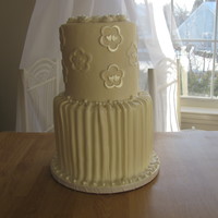 Classic Ivory Wedding cake done in fondant.