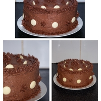 Super Chocolate Birthday Cake Made for a friends birthday. 3 layers of moist chocolate cake covered with chocolate buttercream and decorated with milk and white...