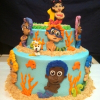 Bubble Guppy Cake Fondant Guppies with Custom Guppy topper to look like birthday girl.