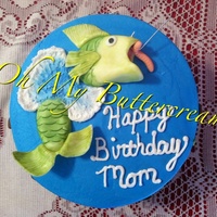 8 Buttercream Cake With Hand Painted Fondant Fish 8" buttercream cake with hand painted fondant fish