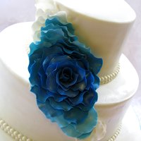Cascading Rose Petal Wedding Cake In Blue Turquoise And Teal Tones Cascading rose petal wedding cake in blue, turquoise and teal tones.