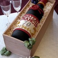 Wine Bottle Cake All Edible The Bottle Is Moulded From Gumpaste And The Box Is Fondant Marbled With Food Gel Colours Wine bottle cake. All edible. The bottle is moulded from gumpaste and the box is fondant marbled with food gel colours.
