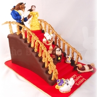 Beauty And The Beast Staircase Cake This cake was commissioned by a guy who wanted to give his Beauty and the Beast-loving girlfriend an epic cake for her birthday. Cake is...
