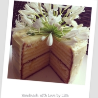 Layered Vanilla And Lemon Curd Cake This cake is made from a light vanilla bean cake, layerd with lemon curd and iced with a lemon cream cheese frosting.