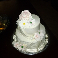 My 11Th Anniversary Cake I made this cake for our 11th anniversary, it has vanilla pudding filling, walnut icing, an the accents were made on fondant and gumpaste...