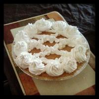 Pumpkin Cheese Cake just a pumkin cheesecake tooped with whip cream
