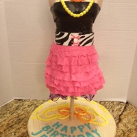 Disco Birthday Party Cake This cake was about 3 feet tall. The bodice is fondant-covered rice krispies. From the high waist down is carved cake. This was for a disco...