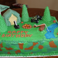 Camping Cake This is a vanilla cake with strawberry filling. The theme was camping. I used buttercream frosting and the decorations were fondant with...