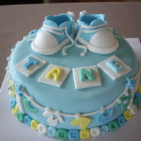 Baby Boy Cakes Welcome to the world little Tane! Chocolate cake covered in fondant with fondant shoes.Clothes were hand cut.. what a mission but oh so...