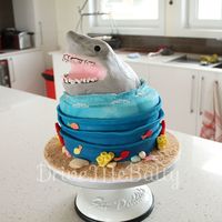 Shark Cake First time using RKT to sculpt this sharks head for a Jaws obsessed boy!I was extremely happy with the shark, although I wasn't...