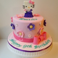 The Birthday Girl Requested For A Hello Kitty With Pink And Purple Flowers The birthday girl requested for a hello kitty with pink and purple flowers.