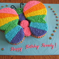Rainbow Butterfly 10/13/2013Made with two 8" rounds and two 6"rounds for wings and cupcakes for body