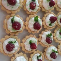 Butter Dough Shells Meringe Cream And Fresh Rasberry And Mint Leaf butter dough shells, meringe cream and fresh rasberry and mint leaf
