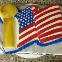 This Is A Red Velvet Cake With Buttercream Icing And Fondant Detailing In A Billowing Us Flag Theme This is a red velvet cake with buttercream icing and fondant detailing in a billowing U.S. flag theme.