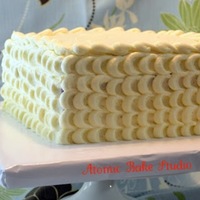 Petal Effect--Cream Cheese (Ivory) Red Velvet/Cream Cheese Frosting with petal effect. This is the first time I have done the petal effect and I really like it, but next time...