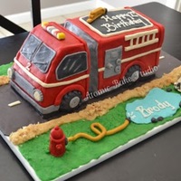 3D Firetruck Firetruck cake for my son. This was my first 3D/sculpted cake. It was also my first time using modeling chocolate. All decorations with the...