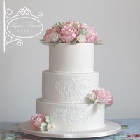 Flowers Love This cake was made for a beautiful bride and groom who got married in New Year's Eve. Flowers are all sugar, it was my first time...