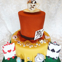 I Was Asked To Create An Alice In Wonderland Mad Hatter Tea Party Themed Wedding Cake In A Fall Color Palette Had Lots Of Fun Creating All... I was asked to create an Alice in Wonderland Mad Hatter tea party themed wedding cake in a fall color palette. Had lots of fun creating all...