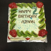 Birthday Cake With Red Velvet Sponge Whipped Cream Frosting And Fruit Birthday cake with red velvet sponge, whipped creamfrosting and fruit.