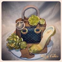 Louis Vuitton Purse Cake With Gold Sugar Flowers Louis Vuitton Purse cake with gold sugar flowers by Leiticia Pestova at Ritzy Cakes
