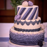 White And Purpel Wedding Cake besides the lace, everything is made out of modeling chocolate