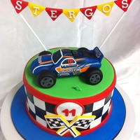 Remote Control Car Cake Car Made Entirely With Marshmallow Fondant Sculpted Using Photos Of Actual Toy Remote control car cake. Car Made entirely with marshmallow fondant. Sculpted using photos of actual toy.