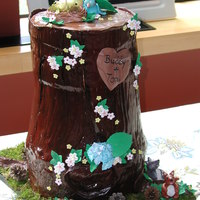 Tree Stump Cake Everything was sculpted from gum paste and fondant but the pinecones and the moss. First time doing flowers and leaves. First time making a...