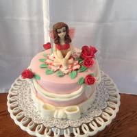 Rose Fairy Cake I've had a heck of a time with figure modeling, and decided it was finally time to learn how to do it. Faces particularly were what...