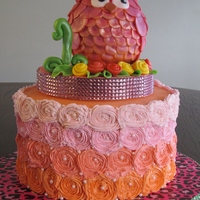 Owl Cake Owl cake topper is fondant over a foam base and foam ball. Meant to be kept as a momento of a 1st birthday.