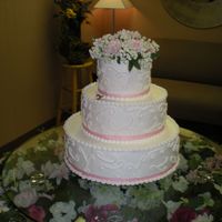 White On White This was my first wedding cake... It is a dummy that was used for a dessert tasting done at a caterer's kitchen.