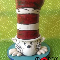 Cat In The Hat! This cake was quite a challenge! His entire hat is made of cake (three tiers!) The head is a dummy, with modelling chocolate used to mould...
