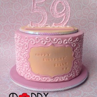 Pink Birthday Cake. The topper is hand piped by me. The cake is caramel mud filled with caramel French meringue buttercream, covered in ganache and MFF.