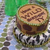 Wild Animal Cake Giraffe and Zebra combo with 'safari grass'. chocolate and vanilla BC on a chocolate and vanilla cake filled with vanilla pudding...