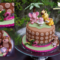 Jungle Fever! Super fun jungle animal cake for a cutie turning 2. The design inspiration was from the invitation for the party. All animals, mini cake...