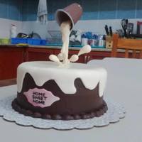 My First Suspended Or Gravity Defying House Warming Mud Cake Filled And Iced With Chocolate Ganache And Decorated With Fondant My first suspended or gravity defying house warming mud cake filled and iced with chocolate ganache and decorated with fondant.