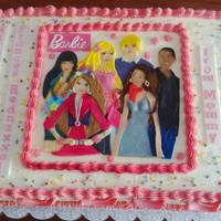 Marble Cake With Ganache Filling And Swiss Buttercream Filling And Frosting Barbie Characters Are Hand Cut From Fondant Marble cake with ganache filling and swiss buttercream filling and frosting. Barbie characters are hand-cut from fondant.