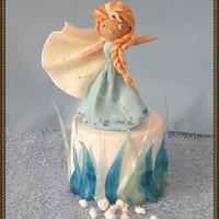 "elsa " From Frozen Elsa. ; it's a little cake topper which made for a frozen cake.whole elsa made from modeling chocolate & the ice crystals are...