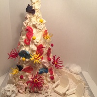 This Cake Is 3 Feet Tall It Is Covered With Waves Of White Modeling Chocolate Shimmered With Royal Pearl Dust The Fish And Sea Horses Are This cake is 3 feet tall. It is covered with waves of white modeling chocolate shimmered with royal pearl dust. The fish and sea horses are...