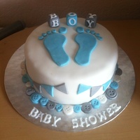 Baby Boy Baby Showe Cake With Fondant Footprints Blocks Bunting And Buttons Baby boy baby showe cake with fondant footprints, blocks, bunting and buttons