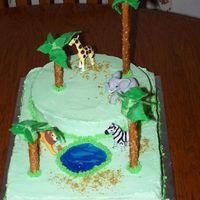 000_1395.jpg My son wanted an animal cake so this is what I did. My poor trees were falling apart, I had to keep adding more icicng to hold them on and...