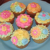 Flowers Of Spring Cupcakes Tried to think Spring with a variety of flowers on these little treats.