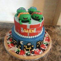 Teenage Mutant Ninja Turtle Cake This is buttercream with fondant accents.