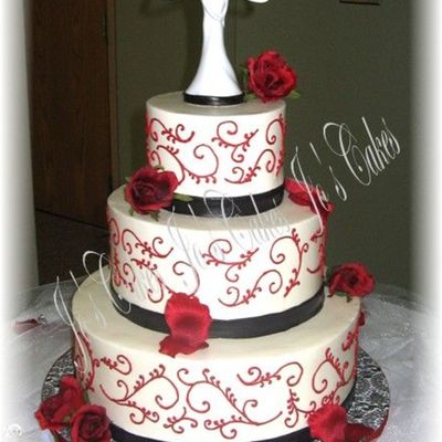 3 Tier Red Scrolls With Black Fondant Ribbon