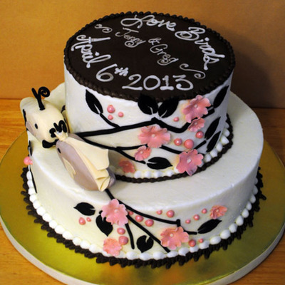 Buttercream Frosted Cake With Fondant Accents And Rice Krispy Treat Fondant Covered Love Birds